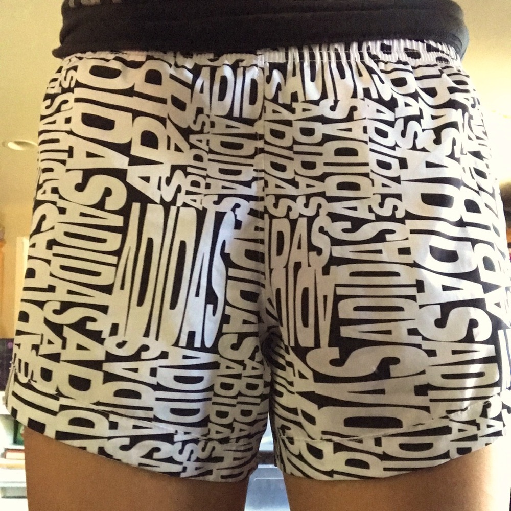black and white adidas shorts. size large (14)